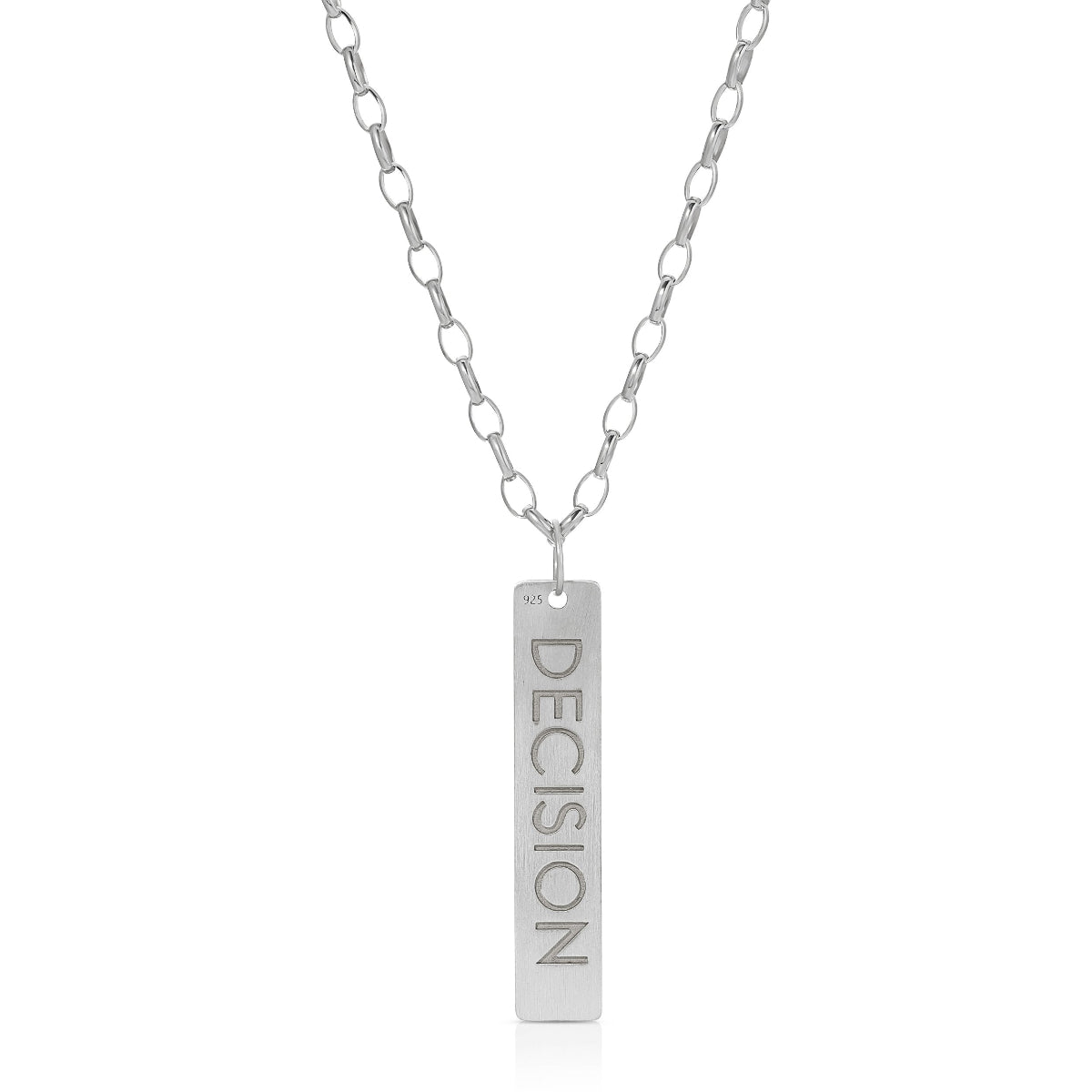 The back of a Virtues Pendant - Rectangle in sterling silver with 'DECISION' engraved on a white background. 