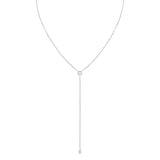 A Diamond Drip Necklace in white gold on a white background. 