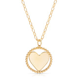 A yellow gold Be Gentle in Grief Necklace showing the side with space for engraving, on a white background. 