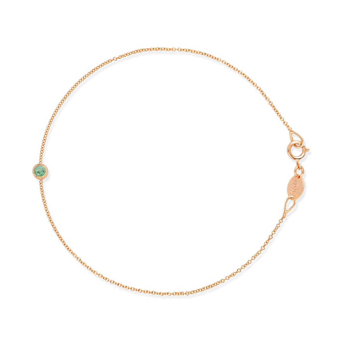 Rose gold bracelet with a small emerald green birthstone charm on a white background.