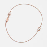 A rose gold Custom Gold Bracelet - 1 Letter with the letter B on a white background. 
