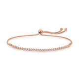 A Tie-Breaker Bracelet in rose gold on a white background. 