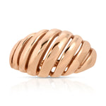 An Etched Paris Ring in rose gold on a white background. 
