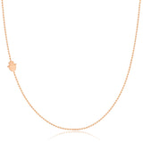 A rose gold 14k Gold Asymmetrical Charm Necklace - Hamsa with a bead chain on a white background. 