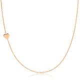 A rose gold 14k Gold Asymmetrical Charm Necklace - Heart with a cable chain on a white background. 