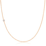A rose gold 14K Gold Asymmetrical Birthstone Necklace - Diamond (April) on a white background. 