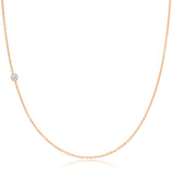 A rose gold 14K Gold Asymmetrical Birthstone Necklace - Diamond (April) on a white background. 