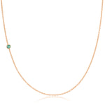 A rose gold 14K Gold Asymmetrical Birthstone Necklace - Emerald (May) on a white background.