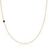 A rose gold 14K Gold Asymmetrical Birthstone Necklace - Garnet (January) on a white background. 