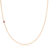 A rose gold 14K Gold Asymmetrical Birthstone Necklace - Pink Tourmaline (October) on a white background. 