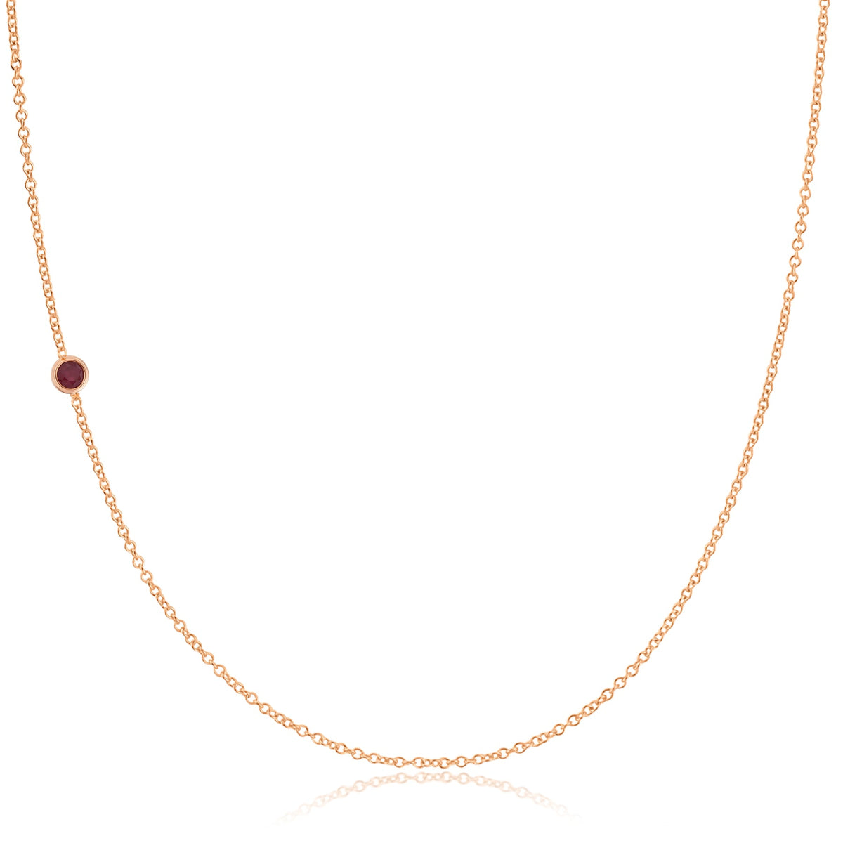 A rose gold 14K Gold Asymmetrical Birthstone Necklace - Ruby (July) on a white background. 