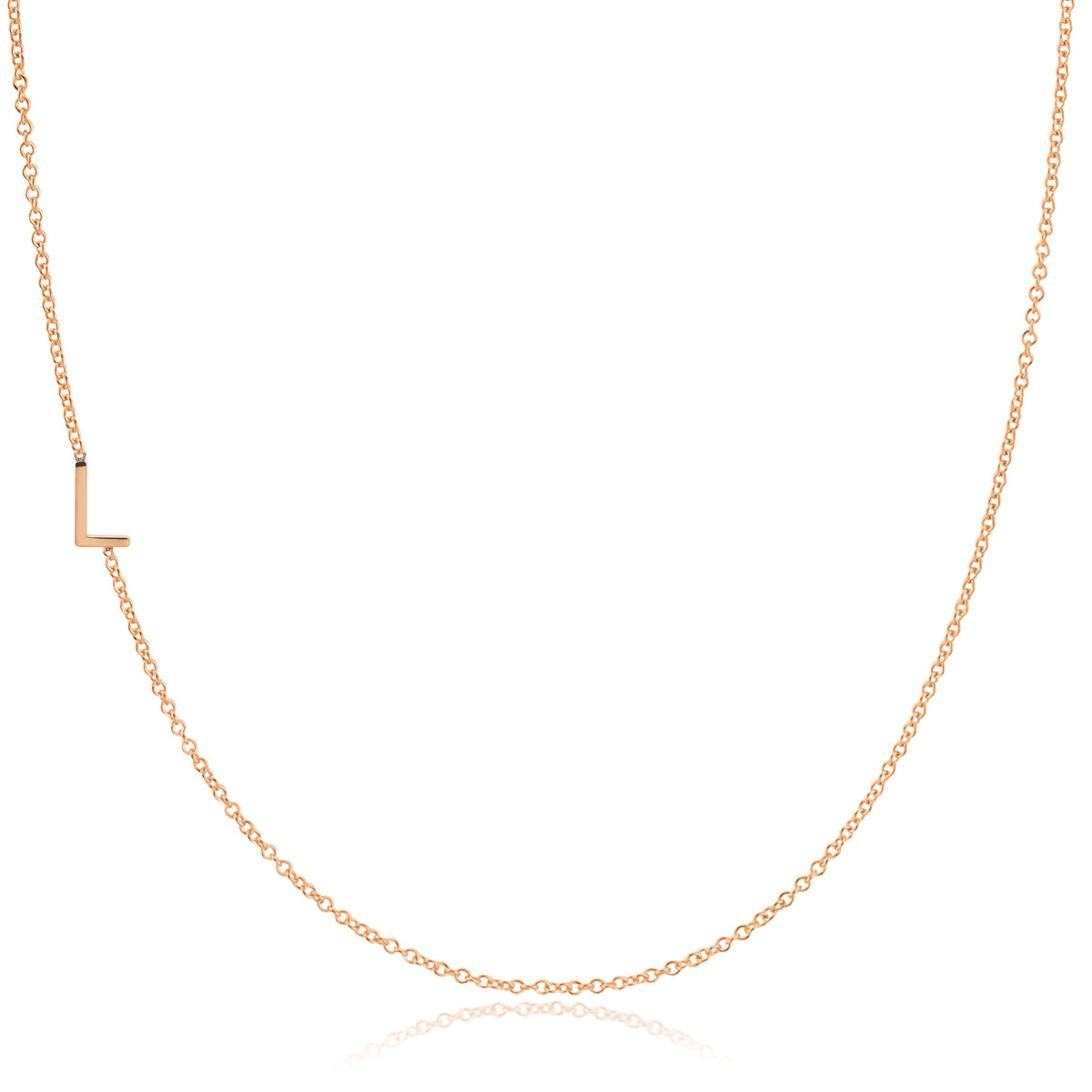 A rose gold necklace with a L letter charm on a white background. 