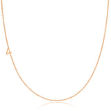 A rose gold 14k Gold Asymmetrical Number Necklace - 4 on a white background. 