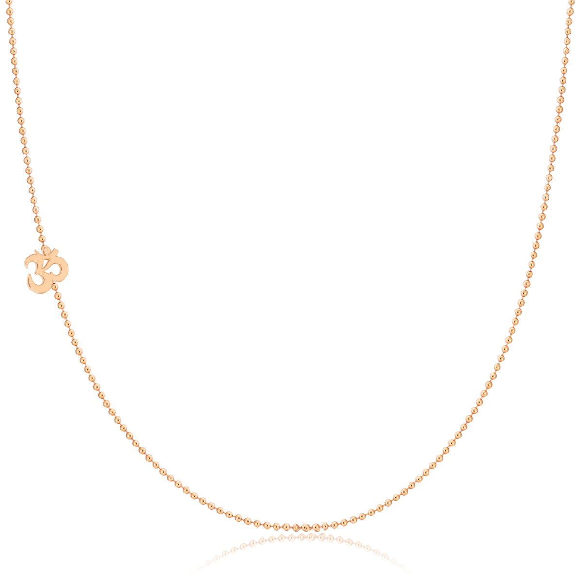 A rose gold 14k Gold Asymmetrical Charm Necklace - Om with a bead chain on a white background. 
