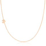 A rose gold 14k Gold Asymmetrical Charm Necklace - Om with a cable chain on a white background. 