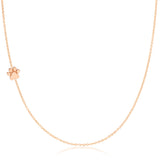 A rose gold 14k Gold Asymmetrical Charm Necklace - Paw with a cable chain on a white background. 