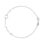 A white gold Custom Gold Bracelet – 4 Letters with the letters L, O, L, A on a white background.