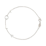 A white gold Custom Gold Bracelet – 4 Letters with the letters L, O, L, A on a white background.