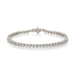 A Love Set Match Bracelet in white gold on a white background. 