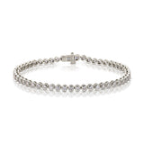 A Love Set Match Bracelet in white gold on a white background. 