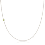 A white gold 14K Gold Asymmetrical Birthstone Necklace - Peridot (August) on a white background. 