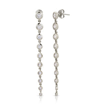 White gold Diamond Cascade Earrings on a white background. 