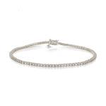 A Down the Line Bracelet in white gold on a white background. 