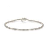 A Down the Line Bracelet in white gold on a white background. 