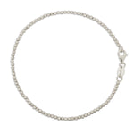 A Diamond Cut Bracelet in white gold on a white background. 