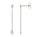 Droplet Diamond Earrings in white gold on a white background. 