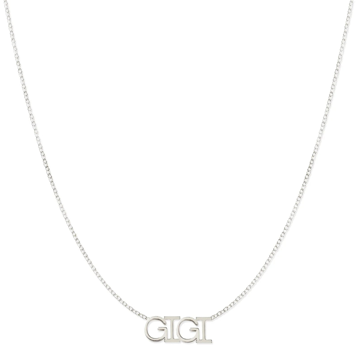A GIGI Necklace in white gold on a cable chain on a white background.