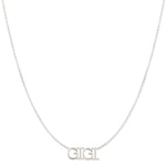 A GIGI Necklace in white gold on a cable chain on a white background.