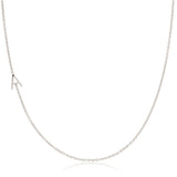 A white gold necklace with an A letter pave charm on a white background. 