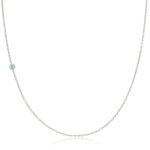 A 14K Gold Asymmetrical Birthstone Necklace - Aquamarine (March) in white gold on a white background. 