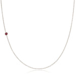 A white gold 14K Gold Asymmetrical Birthstone Necklace - Ruby (July) on a white background. 