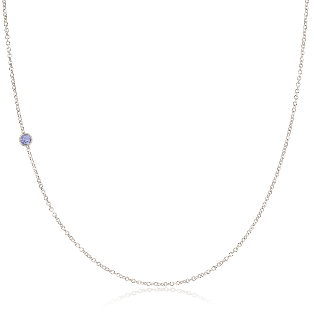 A white gold 14K Gold Asymmetrical Birthstone Necklace - Tanzanite (December) on a white background. 
