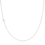 A white gold 14k Gold Asymmetrical Charm Necklace - Cross with a cable chain on a white background. 