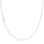A white gold necklace with a D letter charm on a white background. 