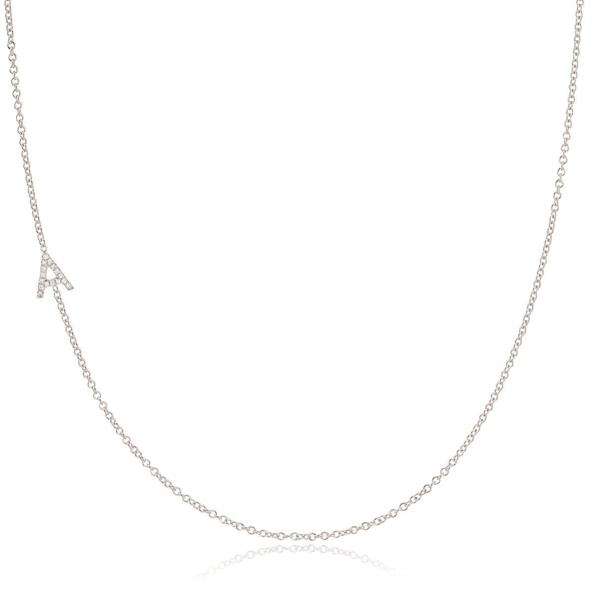 A white gold necklace with a letter A charm on a white background. 