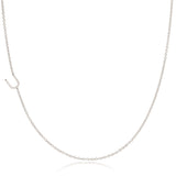 A white gold necklace with a U letter charm on a white background. 