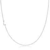 A white gold necklace with a L letter charm on a white background. 