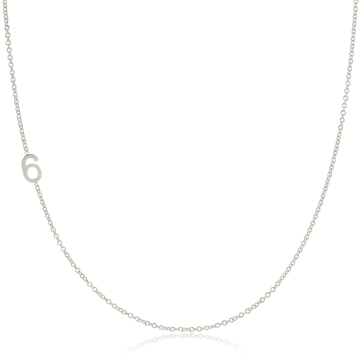A white gold 14k Gold Asymmetrical Number Necklace - 6 on a white background. 