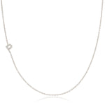 A white gold necklace with a letter P pave charm on a white background.