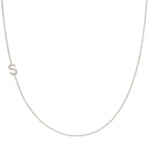 A white gold necklace with a letter S pave charm on a white background.