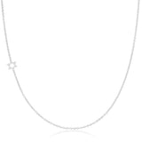 A white gold 14k Gold Asymmetrical Charm Necklace - Star of David with cable chain on a white background. 