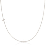 A white gold necklace with a letter T pave charm on a white background.
