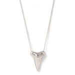 A Sharktooth Necklace with Diamond Ridge in white gold on a white background. 