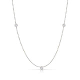 Triple Diamond Layering Necklace in white gold on a white background. 