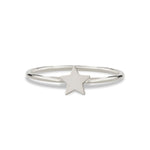 A Twinkle Twinkle Ring in white gold on a white background.