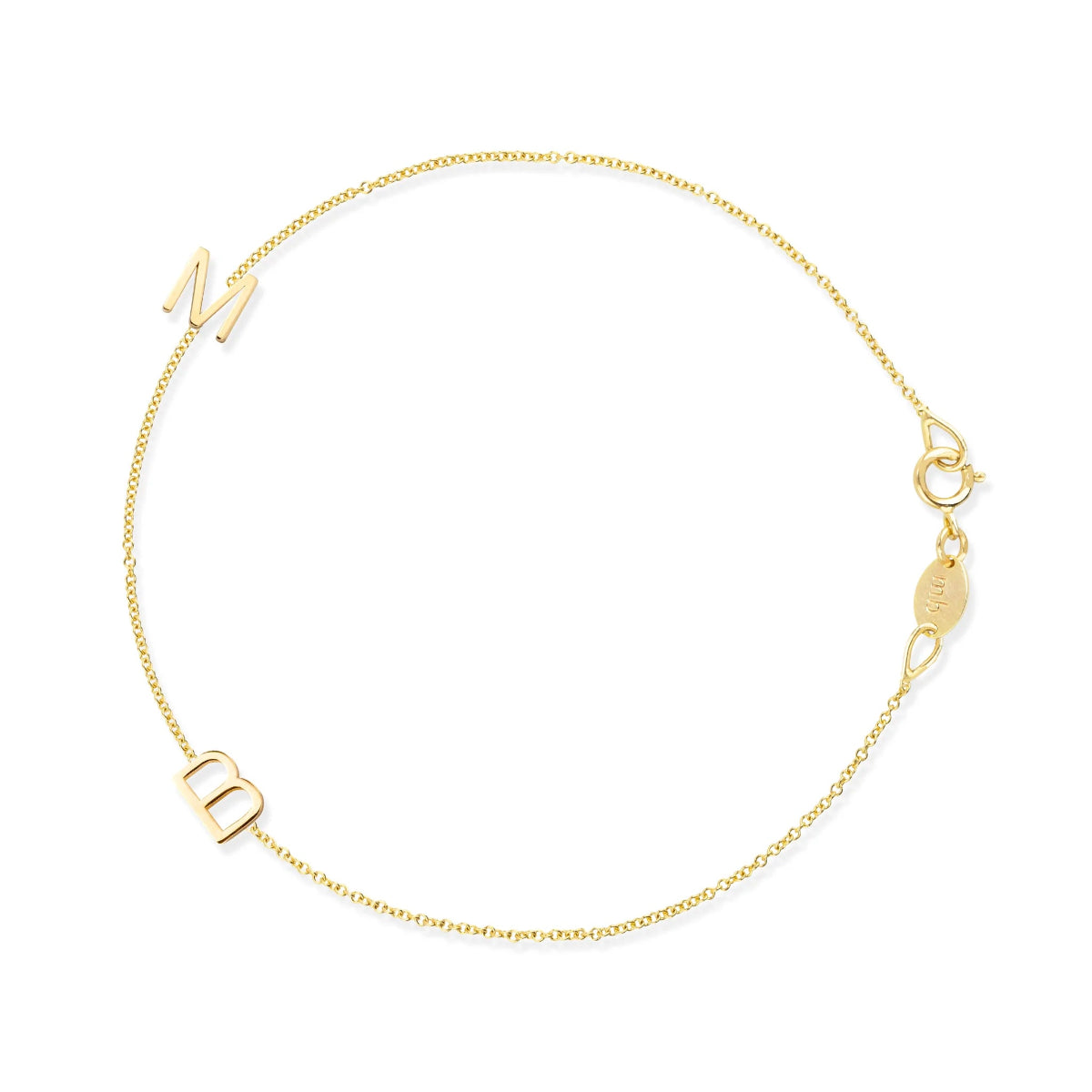 A yellow gold Custom Gold Bracelet - 2 Letters (with the letters M and B) on a white background. 